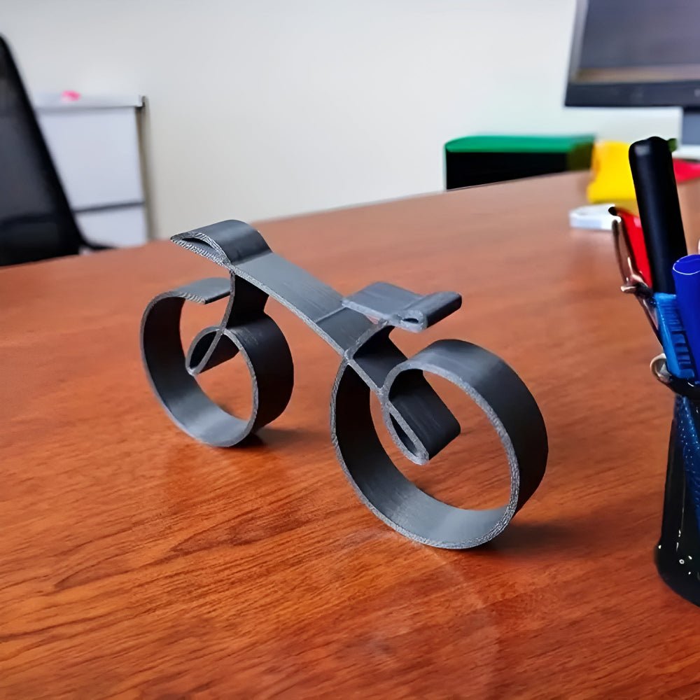 Minimalist style metal cycling sculpture